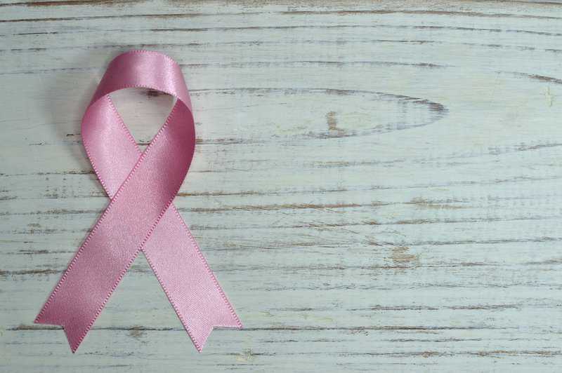 breast cancer ribbon | Top Dentist and Periodontist for root canals, veneers, dental fillings, wisdom teeth extractions, gum disease therapy, and more | Houston 77077